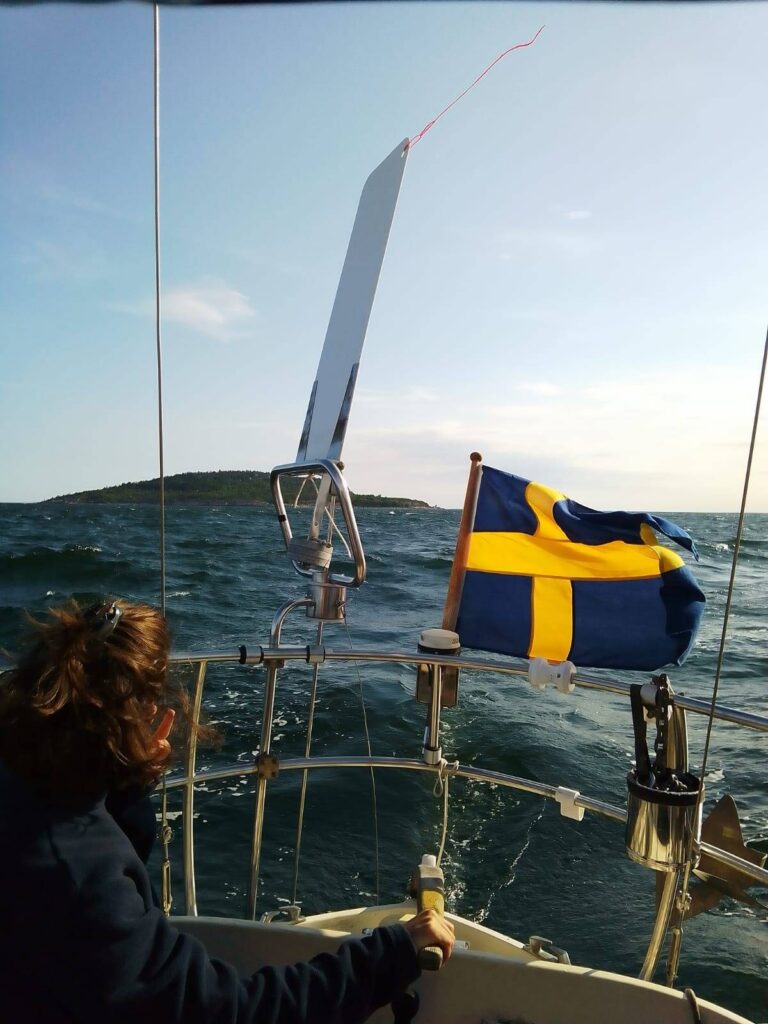 steering swedish flag leaving island