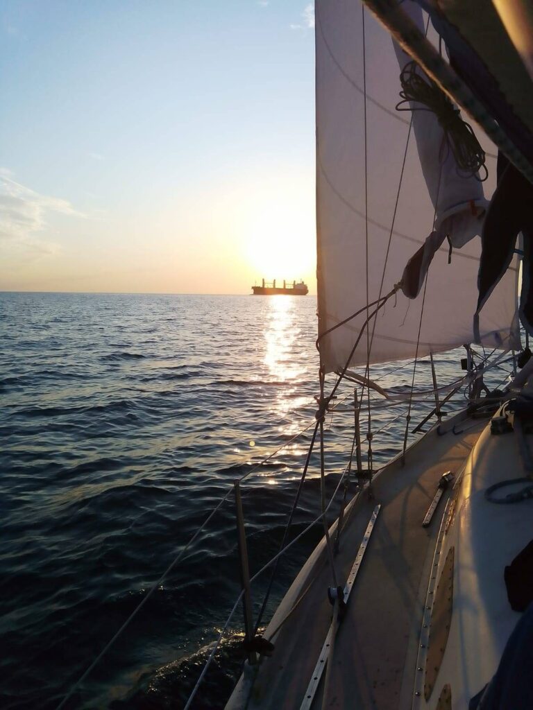 Sun set and cargo ship